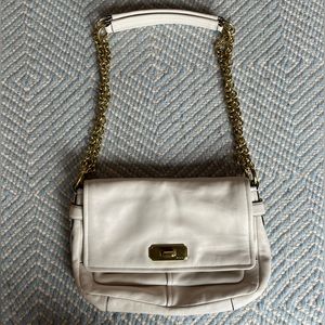 Never worn Coach Chelsea leather flap crossbody purse in white w/ gold hardware